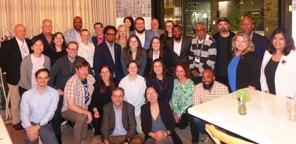 Internet2 emerging leaders scholarship recipients posing for a group photo with internet2 staff.