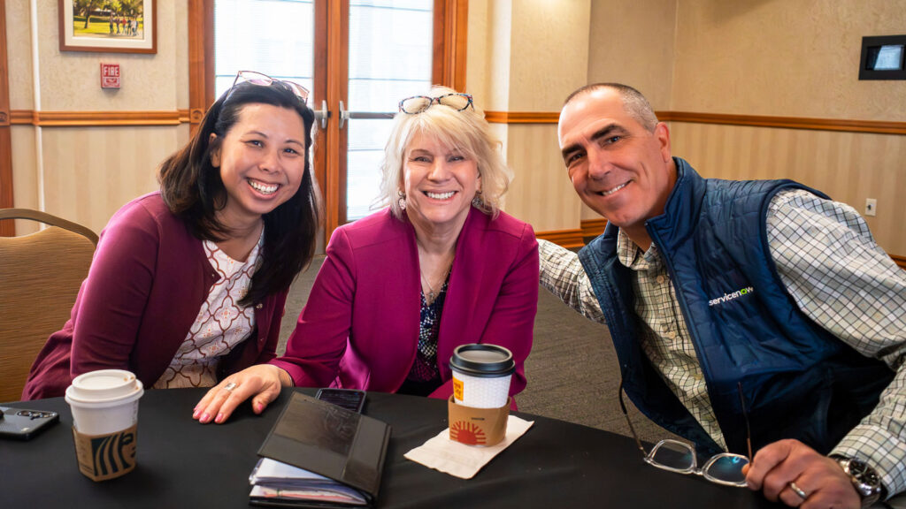 Quyen Vaillant, NET+ Program Manager (left), with Lynn Heide and Steve Velner, Client Relationship Manager and Vice President of Higher Education at ServiceNow.