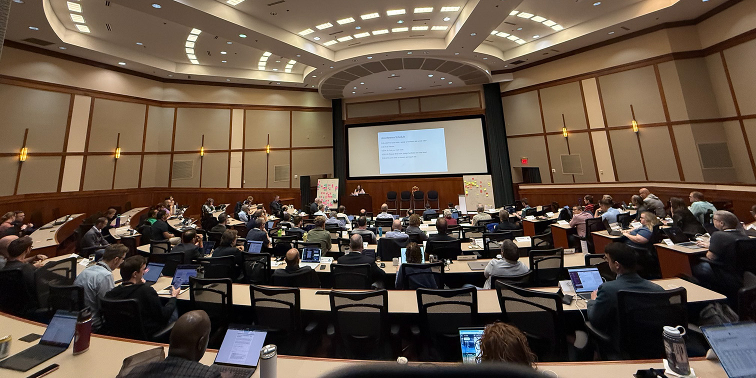 Participants at the 2026 Cloud Forum watch a presentation in the Fluno Center Howard Auditorium, UW-Madison Campus